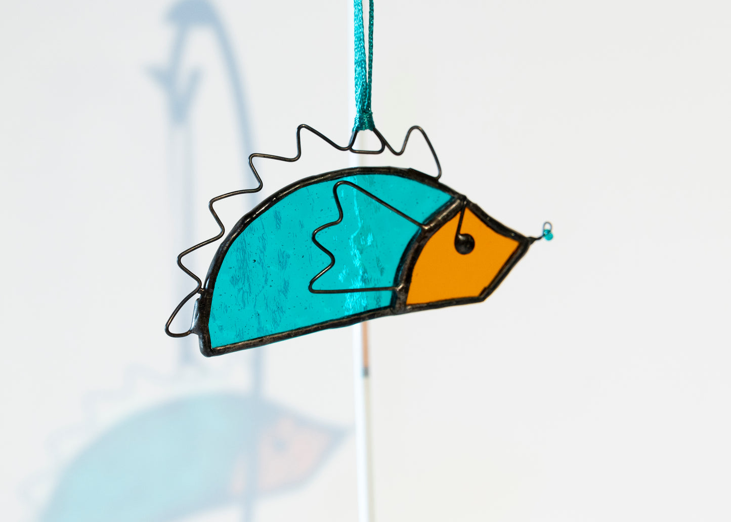 Hanging Glass Hedgehog - turquoise and orange